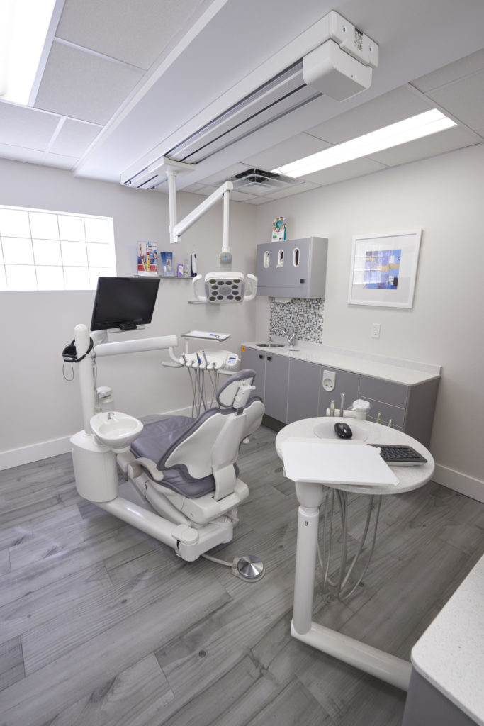 Treatment room of Dental Wellness Team where patients can expect to receive comprehensive general dentistry services in Coral Springs FL.